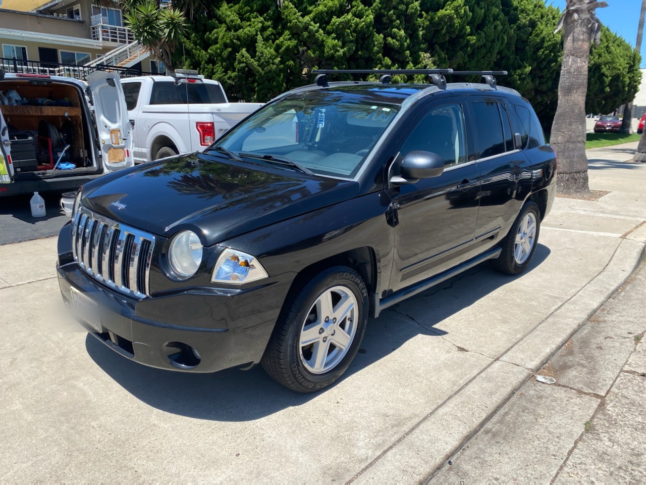 Black Jeep Compass after a full mobile detail