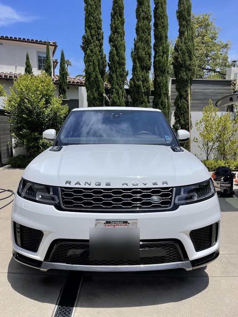 White Range Rover Sport after an exterior wash, decontamination, and wax