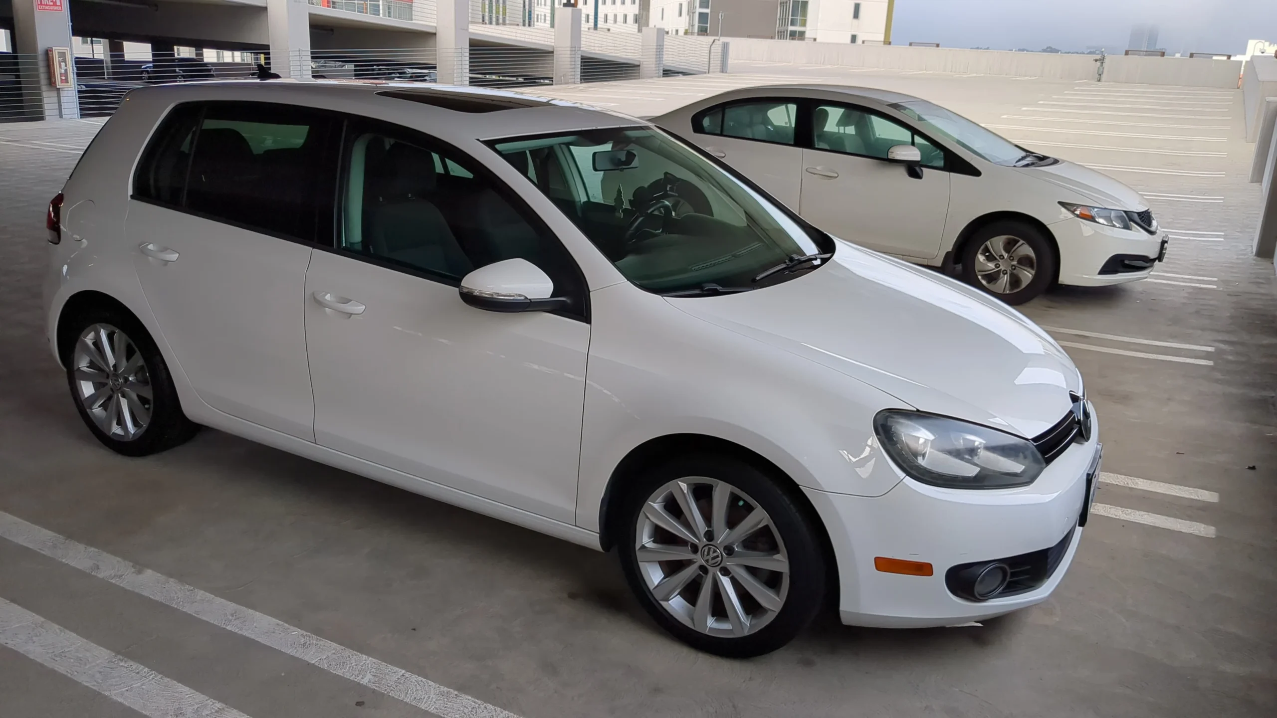 Arjun R.'s white Volkswagen Golf detailed in University City, San Diego