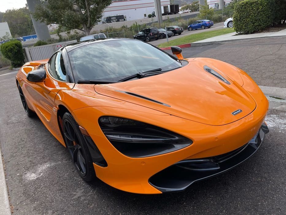 Orange McLaren 720S front three-quarter freshly detailed in Bay Park on Morena Boulevard