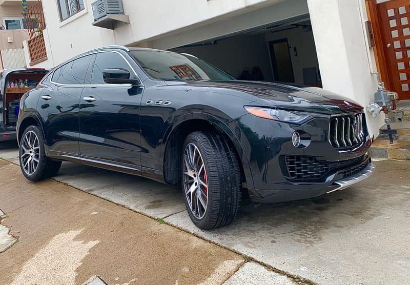 Black Maserati Levante with a deep gloss finish after a mobile detail