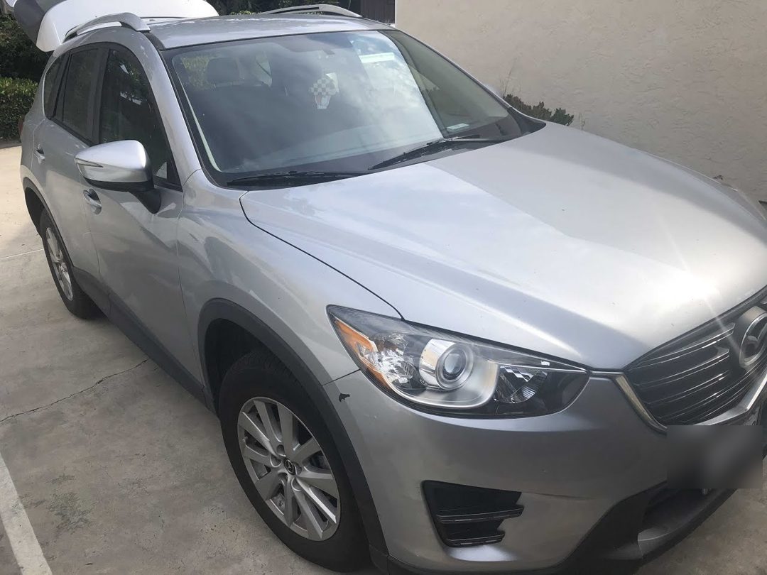 Silver Mazda CX-5 after an exterior wash in Mission Beach