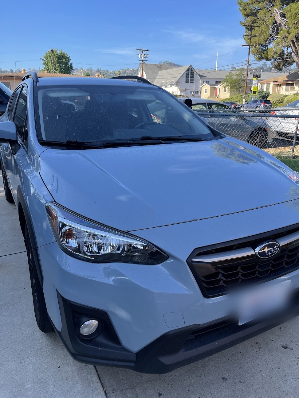Subaru Crosstrek front three-quarter after a mini detail in an El Cajon driveway