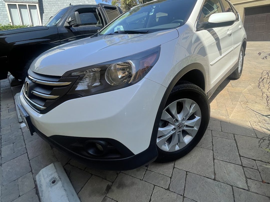Honda CR-V exterior detail finished in a Torrey Pines driveway
